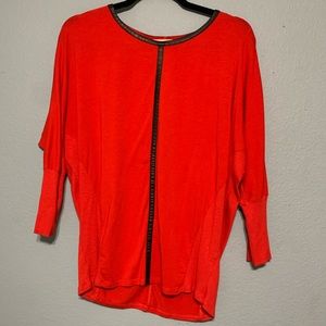 Oversized batwing top with leather accent